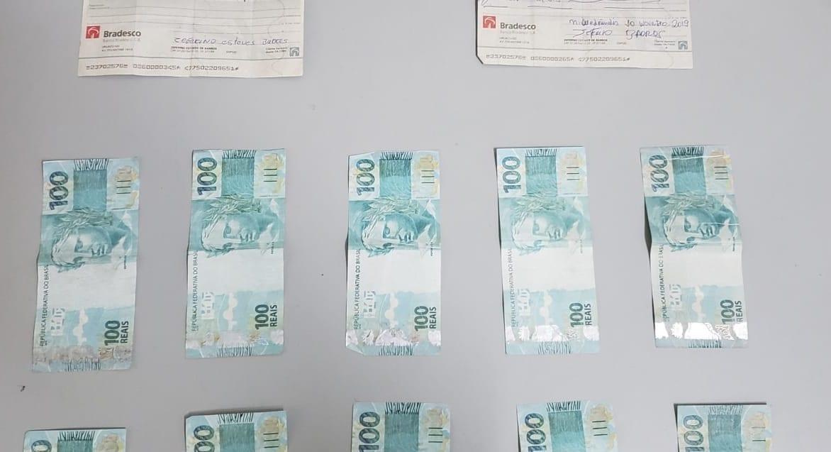 Homem é preso com cheques e R$ 900 reais em notas falsas, em Anápolis